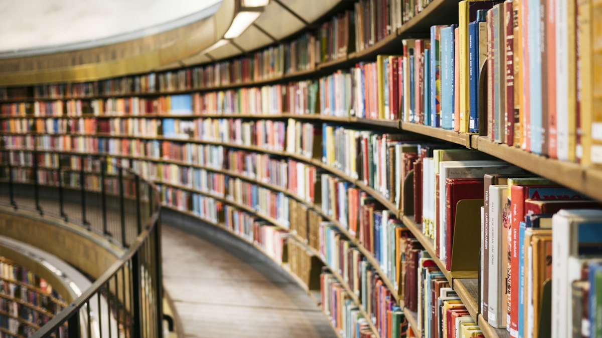 Open books on a table, topical education image